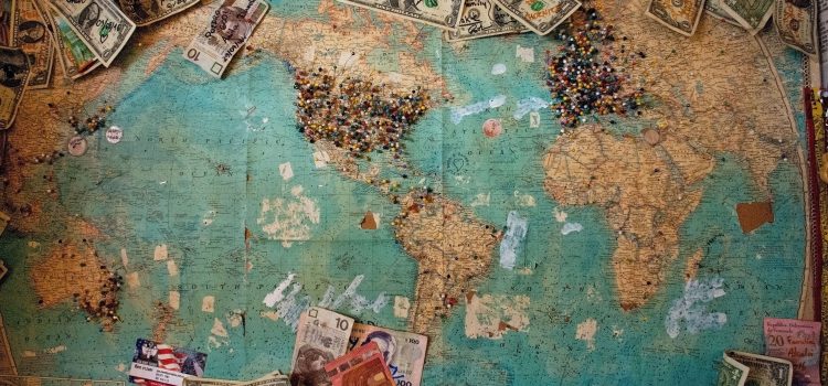 World map with money strewn across as people place bets for where certain snacks are from